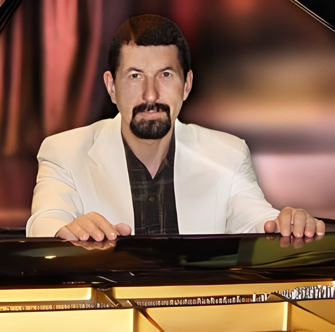 Paul Burd at the piano.